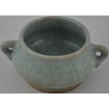 A Chinese twin handled celadon crackle glazed vase,