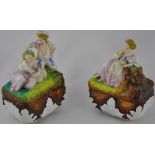 A pair of late 19th Century Continental porcelain boxes,