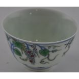 A Chinese Doucai teacup, bears a six character Chenghua style mark to the base.
