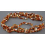 A four strand freshwater pearl and citrine necklace