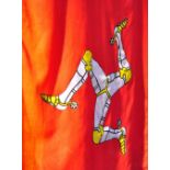 An Isle of Man state flag, together with a vintage British flag embroidered C&W,