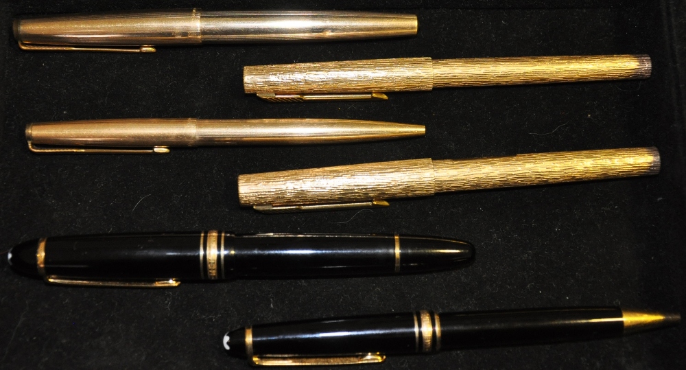 A Montblanc Meisterstuck fountain pen and ballpoint pen, a gold plated Parker 61 fountain pen,