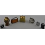 Seven assorted silver plated onyx and chrome vintage table and pocket lighters