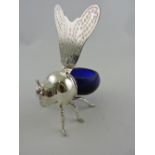 A silver plated honey pot in the form of a bee, with a blue glass body, W. 17cm.