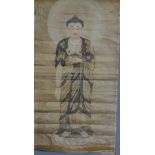 A Chinese rolled scroll depicting an image of Buddha standing upon a stupa.