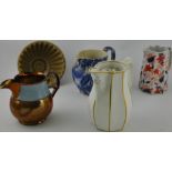 A group of Victorian ceramics including 4 lustre pottery teapots, three jelly moulds,