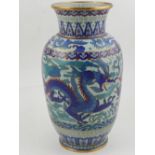 A 20th century Chinese cloisonne baluster vase, decorated with dragons chasing flaming pearls on a