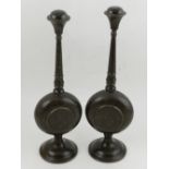 A pair of late 19th century Indian Damascus inlaid metalwork rosewater sprinklers, of compressed