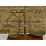 A set of late 19th / early 20th century scales, mounted on wooden base, marker's mark 'May Roberts &