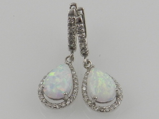 A pair of white metal cubic zirconia and opalite drop earrings, stamped 925.