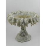 A 19th century carved alabaster tazza, the bowl having vines and grape border, raised on a