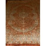 A pile silk Kashmiri rustic ground rug, having lobed floral medallion to centre, multi-border and