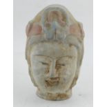 A 20th century South East Asian clay head bust of a deity.