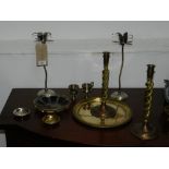 A pair of white metal candlesticks, having star design to top, set on a circular base, together with