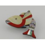 A mother of pearl inlaid brooch in the form of a fish, having white metal pin, stamped 925. W.5cm