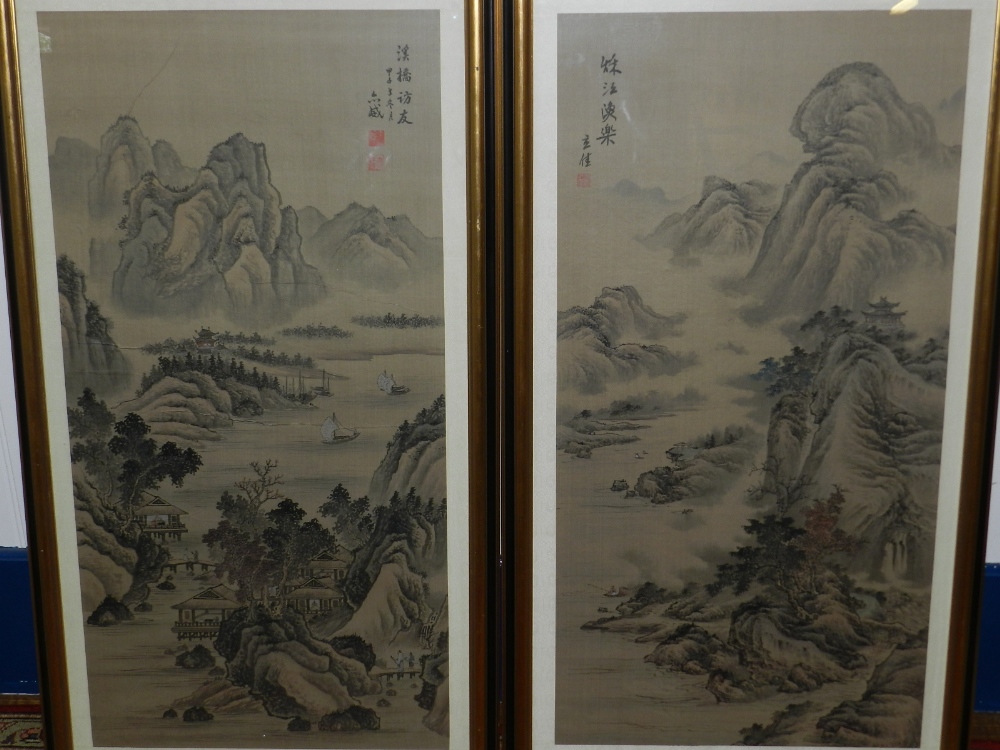 Two early 20th century Chinese school stylised mountainous landscapes with pagodas and figures,