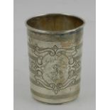 A 19th century Russian white metal beaker, possibly Odessa, decorated with vignette and engraved