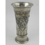 A Continental white metal trumpet shape vase, possibly North European, repousse decorated with