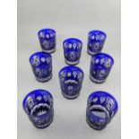 A set of eight Bohemian blue drinking glasses.