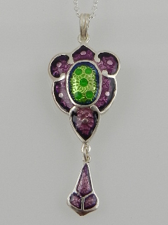 A white metal and enamel set pendant, stamped Sterling, together with white metal chain.