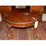 A 20th century walnut circular coffee table, raised on moulded cabriole legs, claw and ball feet. D: