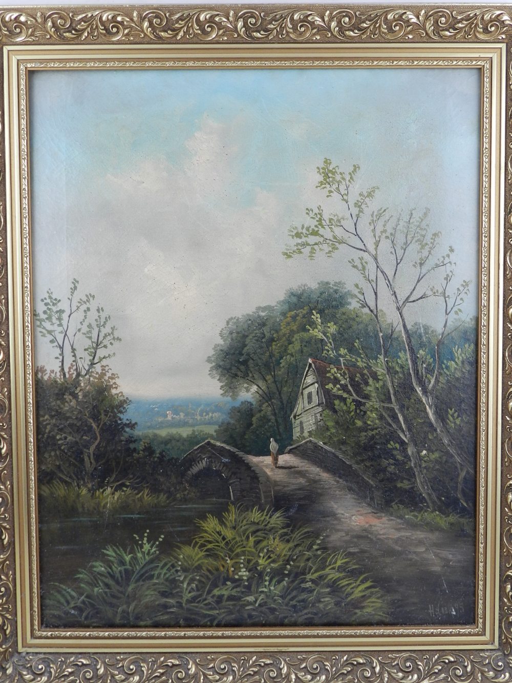 19th century Continental School, Figure on a Bridge Beside a Cottage, oil on canvas, 49 x 38cm.