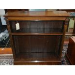 An early 20th century mahogany bookcase, raised on a square stepped base. H.112cm W.107cm D.30cm