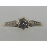 An early 19th century solitaire diamond ring.