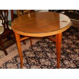 A Southern-German Art Deco period walnut centre table, raised on squared tapered splayed legs united