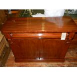 A 19th century mahogany side cabinet, fitted shaped frieze drawer above two cupboard doors. H: