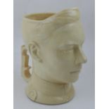 Thorens, Switzerland. A musical ceramic character jug in the form of King Edward. H: 23cm