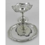 A silver comport, having reticulated rim, hallmarked Birmingham 1947. H.7cm, together with a