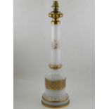 A Bohemian opaque glass top table lamp, decorated with gilt scrolling foliage. H.60cm