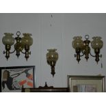 A pair of 20th century brass and mahogany bound two branch wall lights, together with a matching