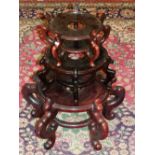 Three Chinese wooden pot stands. H.27cm D.35cm (largest)