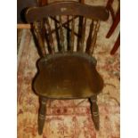 A pair of 20th century stained pine dining chairs.