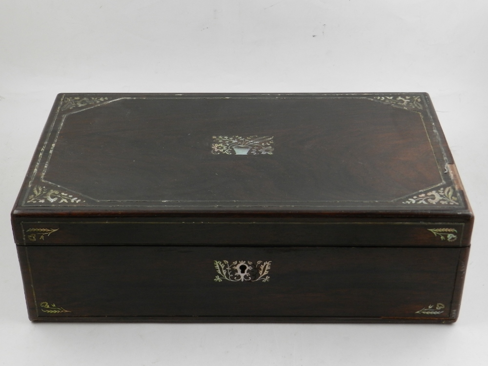 A William IV rosewood, mother-of-pearl and pewter inlaid writing slope, with a fitted interior, W.