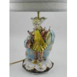 A 20th century Italian table lamp, in the form of a jester.