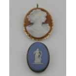 A 9 carat yellow gold mounted cameo decorated with a profile portrait of a lady,