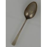 A 19th century silver tablespoon, bears indistinct hallmark for London.