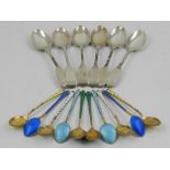 A set of ten Danish sterling silver and guilloche enamel spoons, various colours,