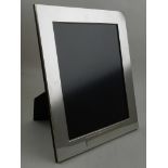 A sterling silver picture frame.