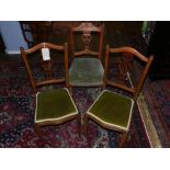 A pair of Edwardian boxwood inlaid mahogany dining chairs,