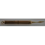 A 9ct yellow gold telescopic toothpick with engine turned, twist operated body, L5cm 5.