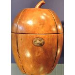 An antique style fruitwood melon shaped tea caddy