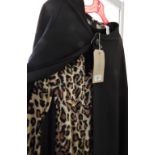 Full length stage costume cape together with leopard print fancy dress bodysuit
