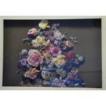 A decoupage picture of flowers in a Grecian style blue and white vase, in a gilt frame,