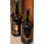 A Harveys commemorative 1971 bottle of Sherry together with a 1981 Harveys commemorative bottle of