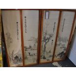 Four silk panels with embroidered landscape scenes, framed in pairs. H.