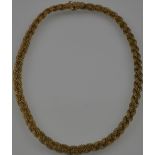 An Italian 9ct yellow gold woven link necklace of multistrand form L 40 cms 12 gr.